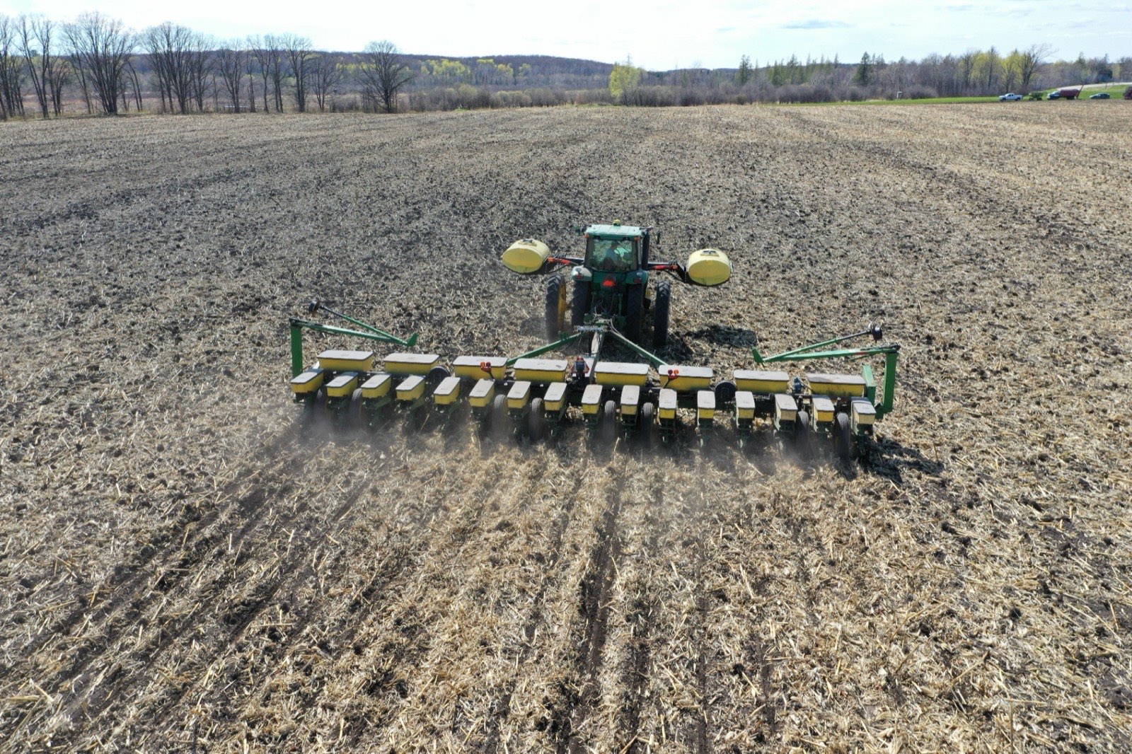 Aerial view of a planter seeding directly into corn stubble